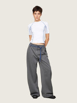 Grey pants with decorative folds